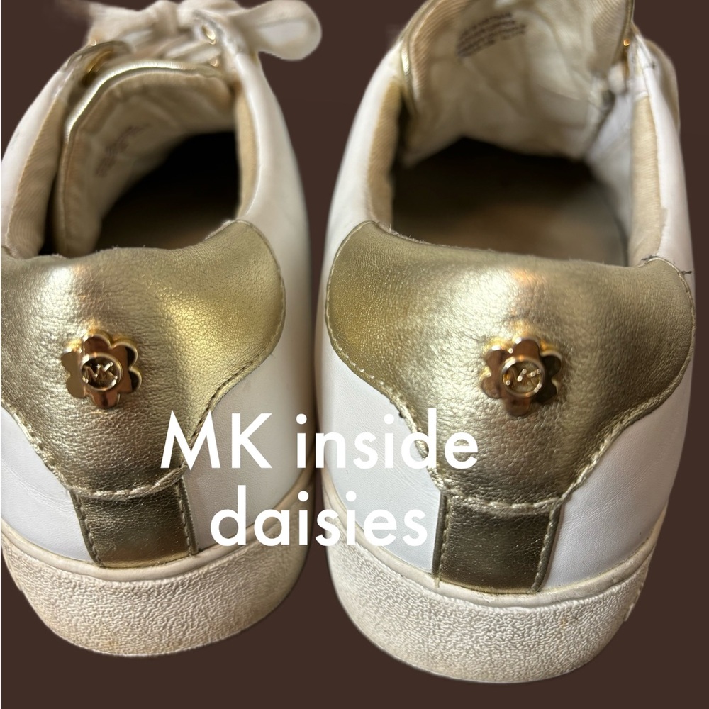 Size 8.5 Michael Kors "Irving style" Lace Up sneaker with gold accents.